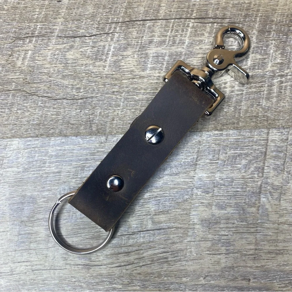 Trigger snap keychain brown rustic leather cross silver/gold toned circle